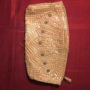 Cream beaded clutch